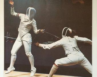 Woman fencing in a match