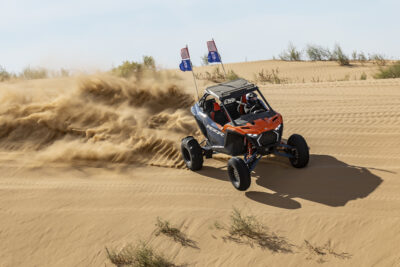 Danielle Becker drives the Polaris RZR Pro lineup while attending CampRZR in Glamis, California.