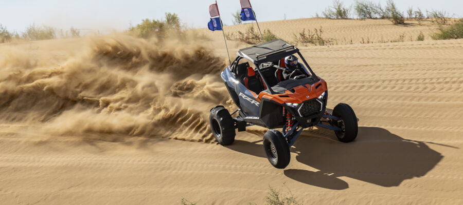 Danielle Becker drives the Polaris RZR Pro lineup while attending CampRZR in Glamis, California.