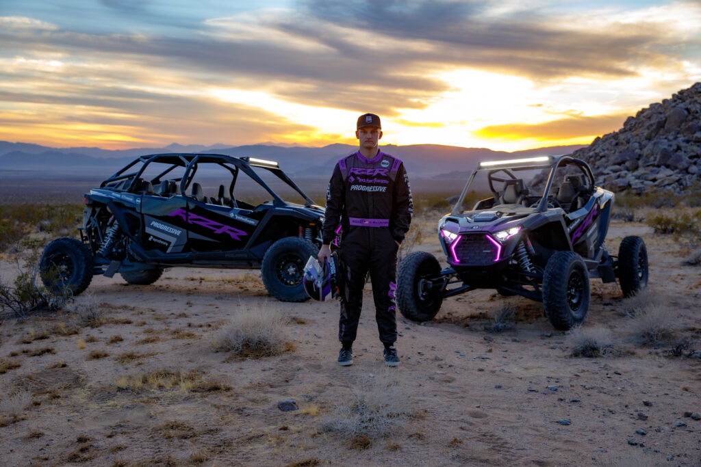 Baja 1000 winner and Polaris factory racing team member, Cayden MacCachren, and the Polaris RZR Pro R Race Replica